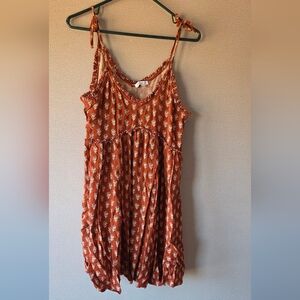 Patrons of Peace Terracotta Dress with Ivory Floral Design